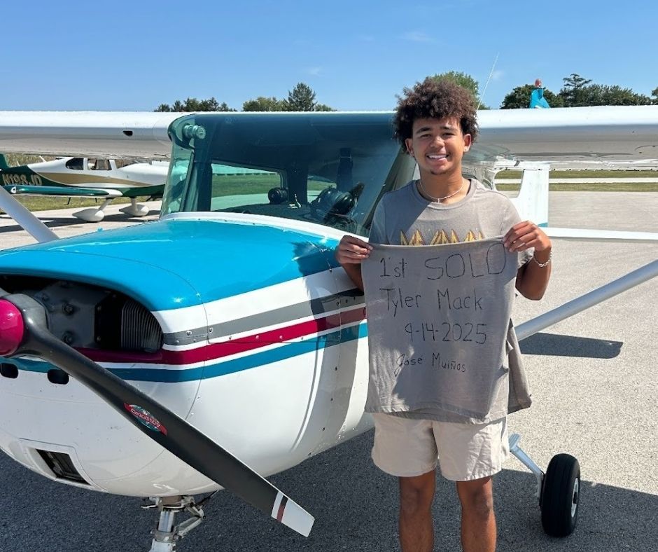 Tyler Mack next to his flight instructor's Cennsa 150 after his first solo trip